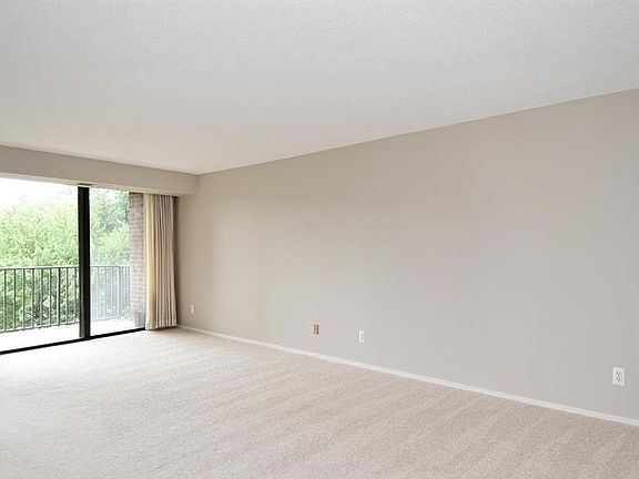Spacious living room with a balcony
