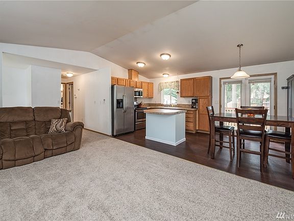 Open concept kitchen/dining/living rooms