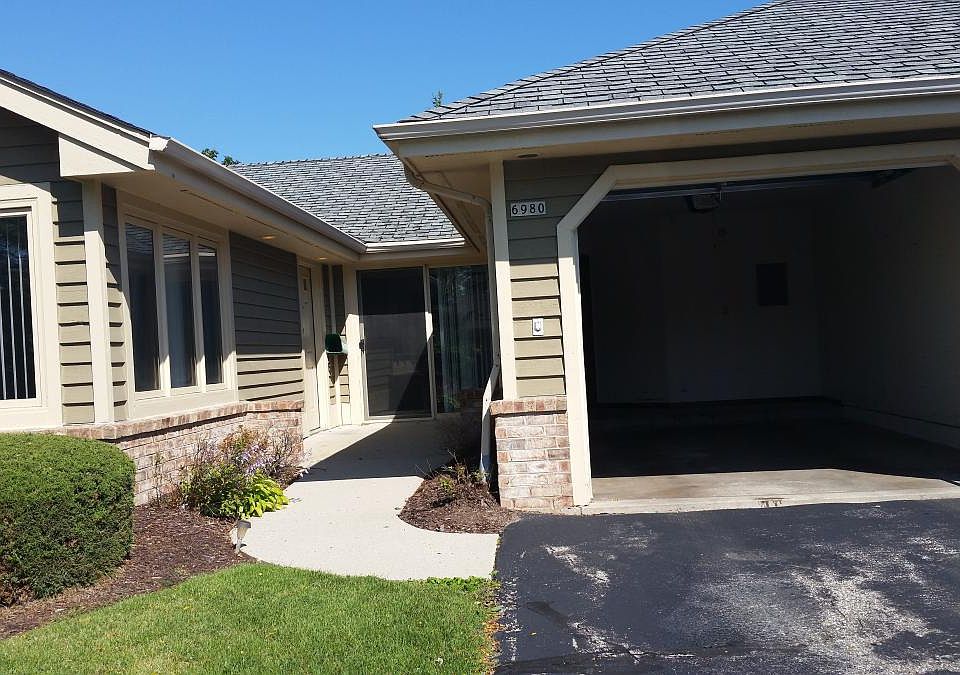 Attached Garage w/ Drieway