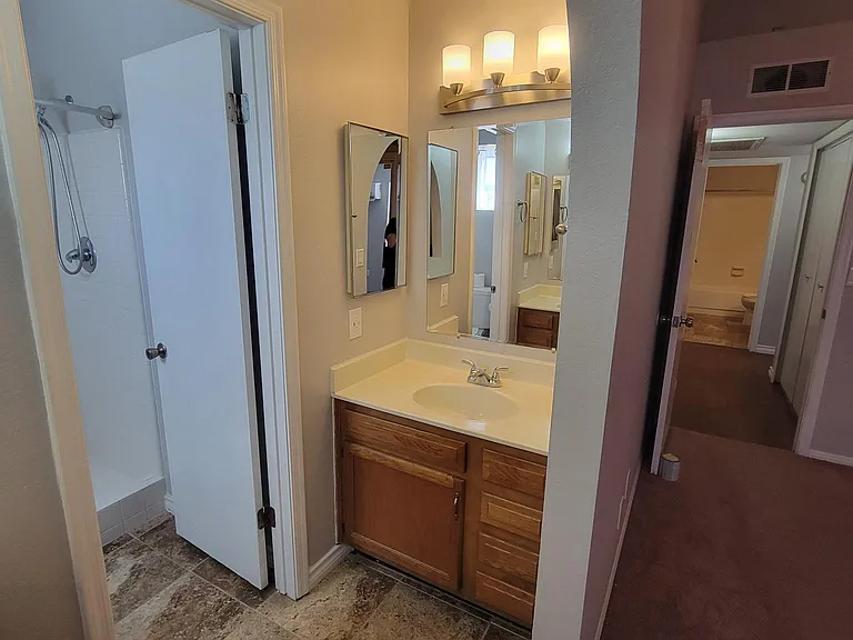 Master bath has double vanities