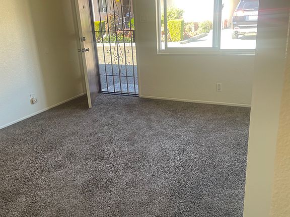 Heavy metal security doors, hard core entry door each with dead bolt and entry locks; walk in the front door here or drive up to your back door for easy access to unloading plus a backyard area