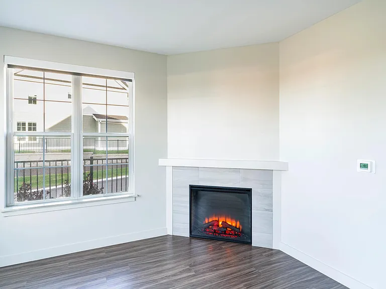 Select apartment homes at Modera South Shore include a fireplace feature_perfect for cozy New England evenings.