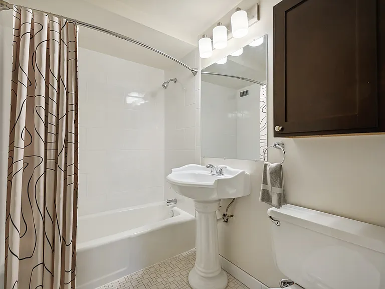 Welcome to Central Lakes of Uptown, where modern design meets comfort. This stunning bathroom features stylish fixtures and ample space, perfect for your daily routine. Step into luxury and make this your new home today!