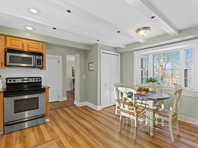 Kitchen looking toward entry to dining room and family room
