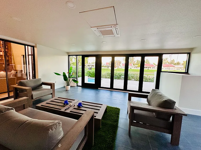 Nice, big indoor patio with expansive glass door.