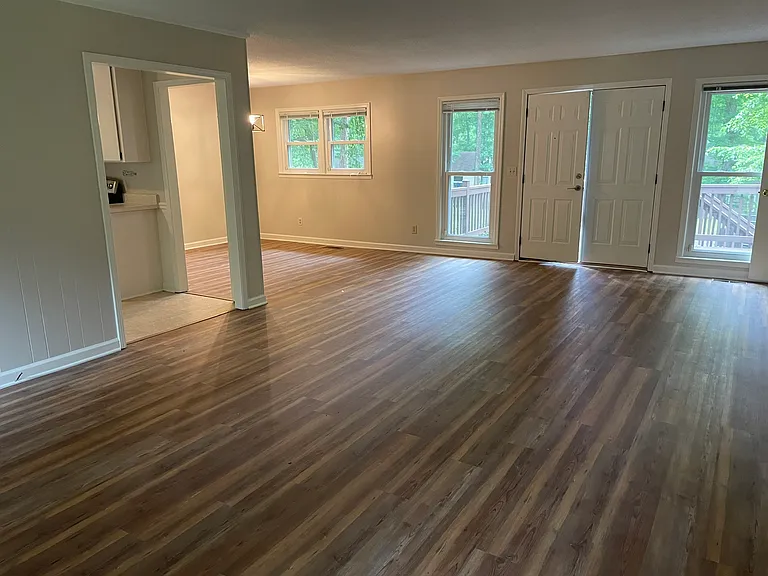 Living room and dining area to the left