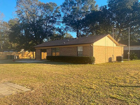 BACK AND SIDE VIEW OF HOUSE 