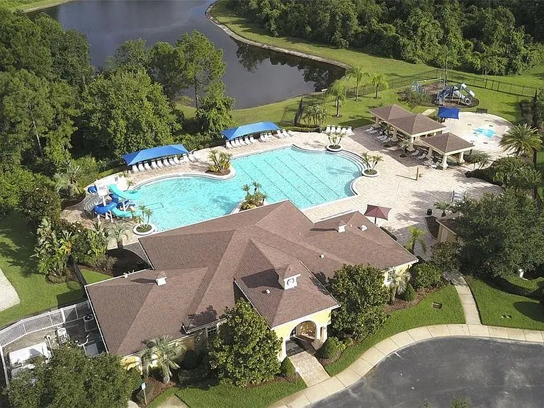 HOA Clubhouse with Pool, splash pad & park, volleyball court and fitness area