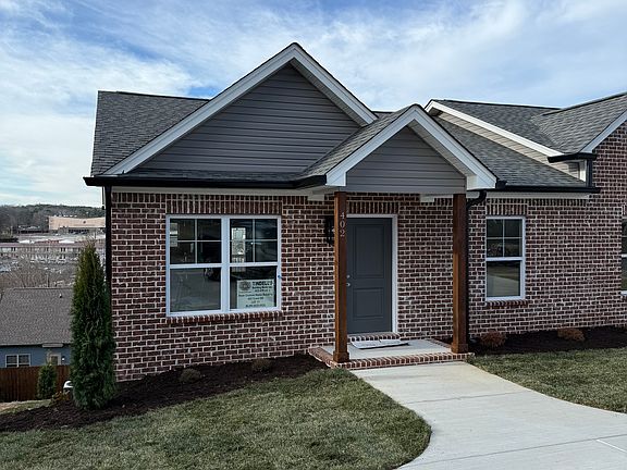 Left townhome is 402 Crest Drive NW.