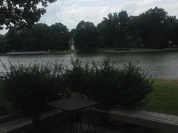 Relax on porch facing Wilde lake!