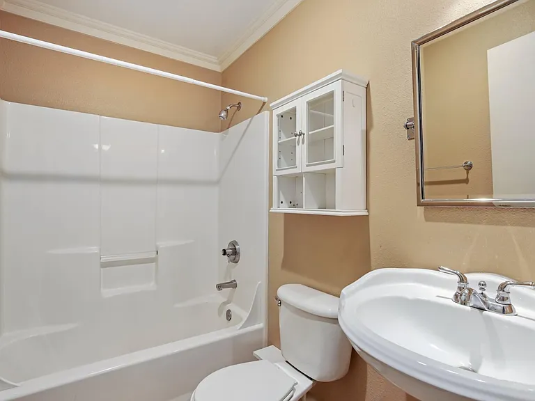 Top back bedroom en suite bathroom.