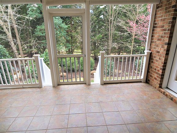 screen porch with tile floor