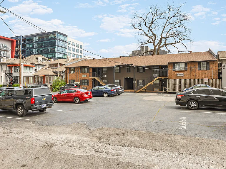 1 dedicated parking spot in the back of the building. Plenty of additional free street parking.