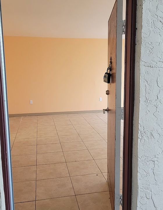 Entrance into condo. You walk into the Family room/Dining room Combo. Open plan