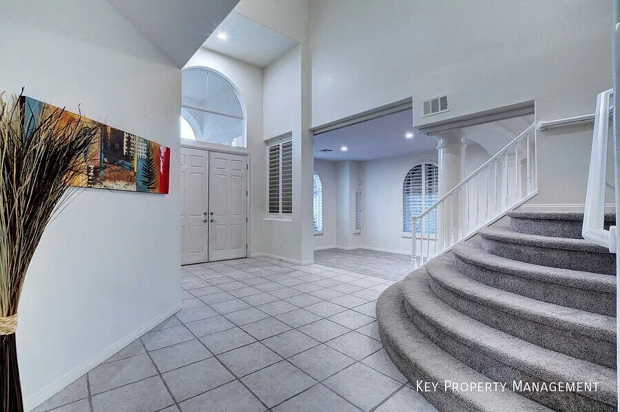 Guard-Gated Luxury in The Grand Legacy: 5-Bed Golf Course Home with Waterfall Pool — Photo 3