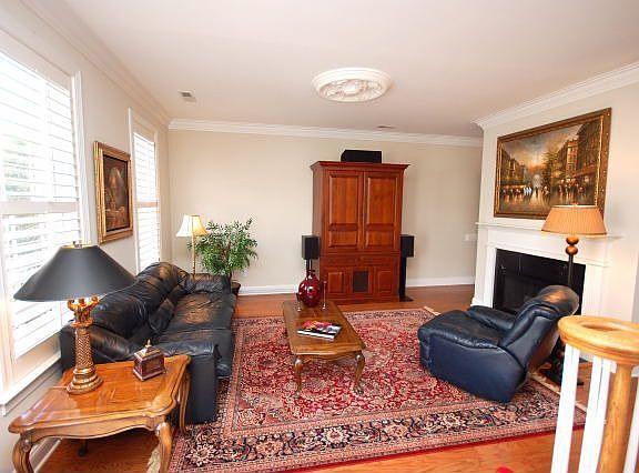 New Hardwood Floors, Plantation Shutters, Dual-Sided Gas Fireplace