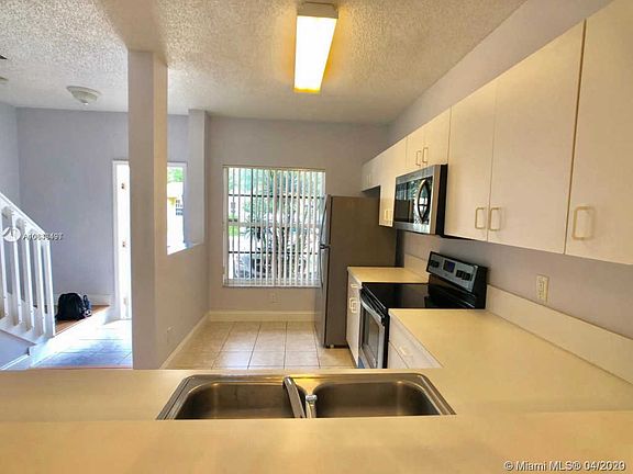 4th image of 12218 SW 8th Ct #12218