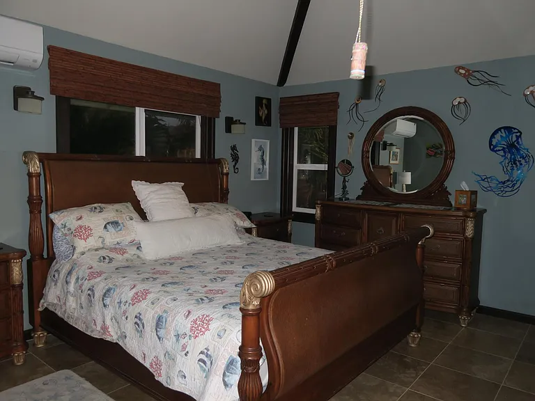 Master bedroom with King size bed.
