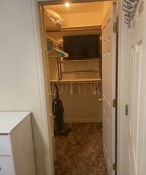 Walk-in closet off of bedroom.
