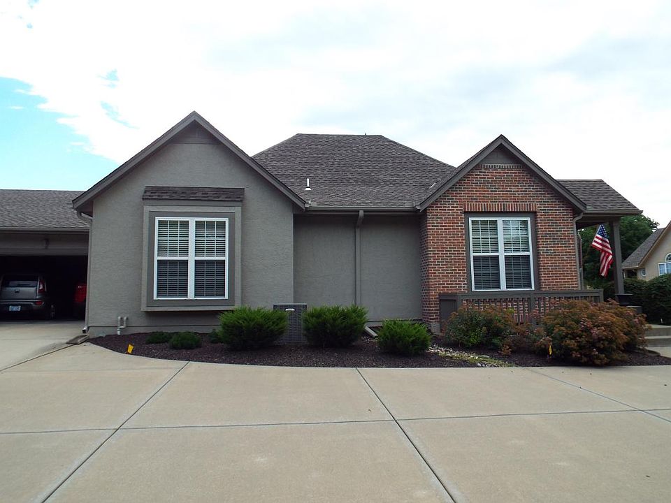 West side of home with 2-car garage and plenty of parking for guests