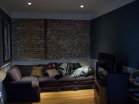 Exposed Bricks throughout Living Room
