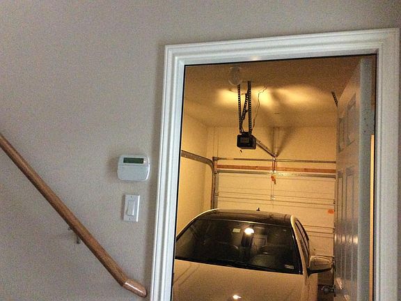 Entry directly into unit from garage. Alarm system, garage door opener.