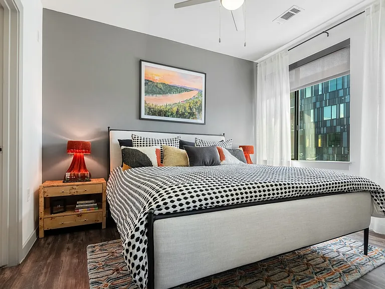 Spacious Second Bedroom with Natural Light and Connected Bath