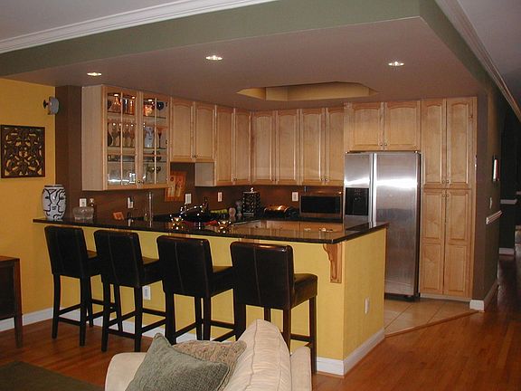 Kitchen with Countertop Bar Seating Area