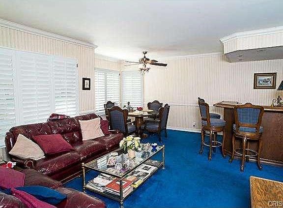 The cozy family room offers a bay window eating area with ceilin