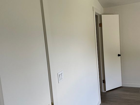 Double-door, walk through closet in bedroom.