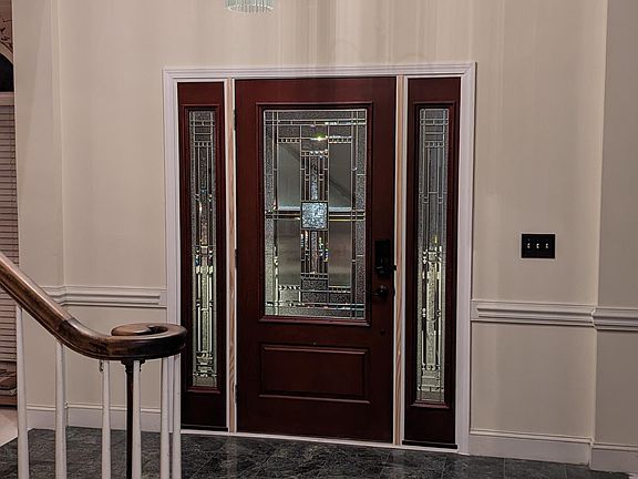 Entry way with marble floor.
