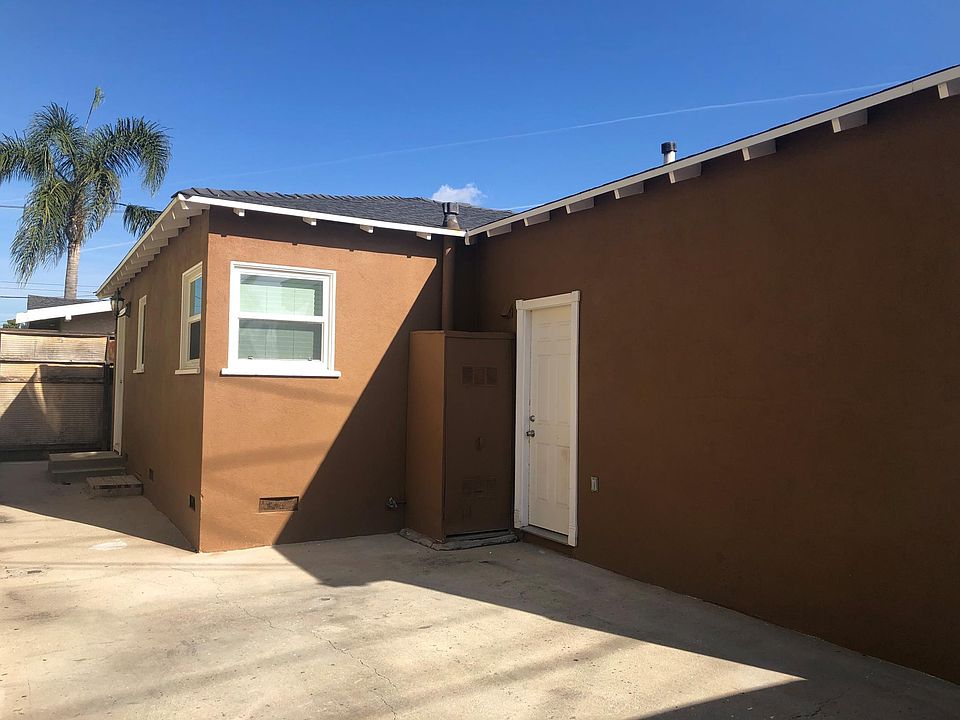 Back entrance and one car garage