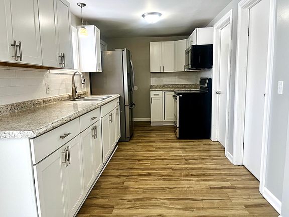 updated kitchen with stainless steel appliances