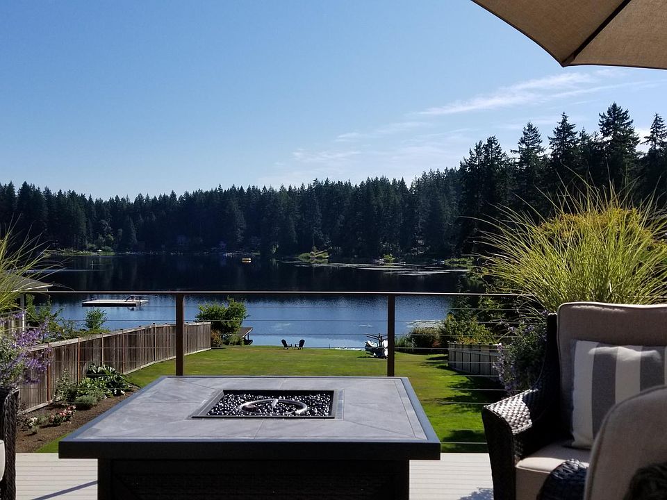 entertainment size deck off great room enjoying full day sun