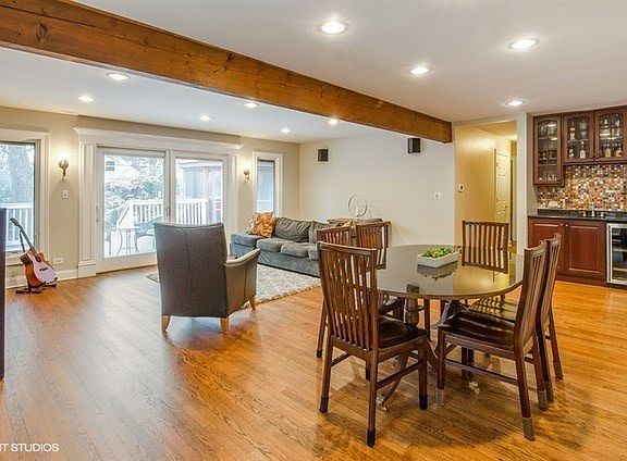 Opens to deck with screened gazebo and hot tub