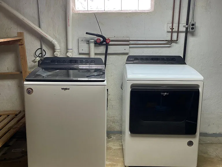 Brand new washer and dryer in basement