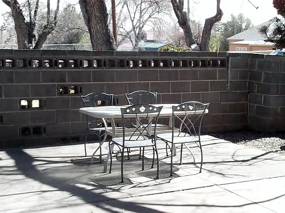 Private patio, block wall will be removed due to safety issues