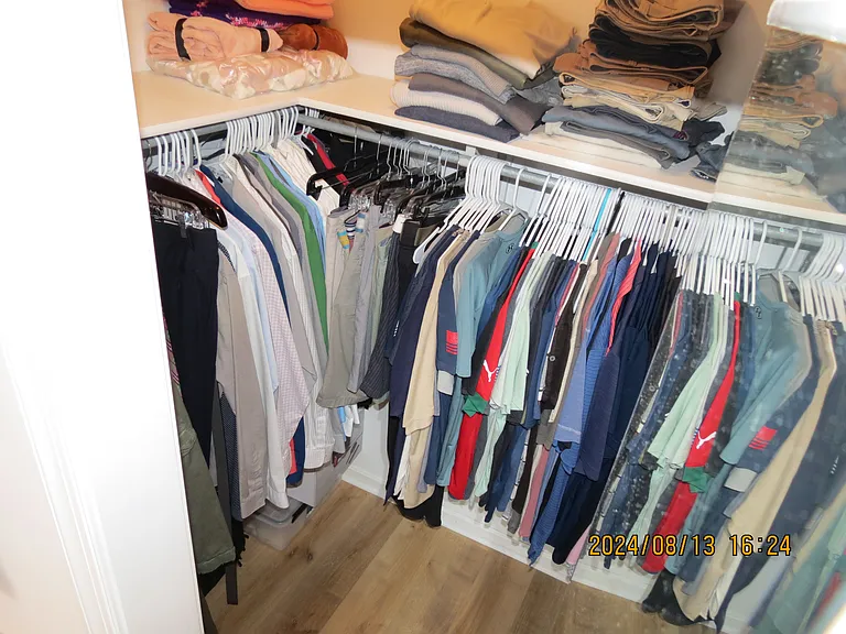 Walk-in Closet in Master Bedroom Bathroom