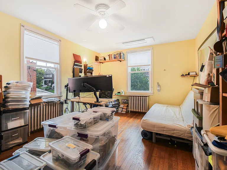 North east bedroom/office from entry door. Mini-split ceiling HVAC unit for heating/cooling.