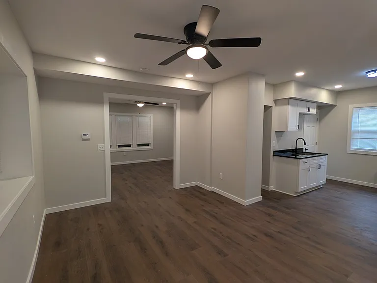 Open layout Dining and Kitchen Area With Plenty Of Natural and Ceiling Lighting