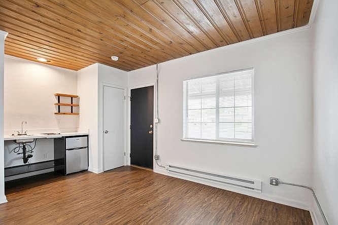 Standard studio with new cabinets, shelving and appliances