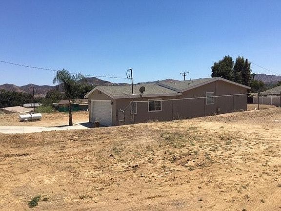 North side of property. Vacant-non-buidable lot