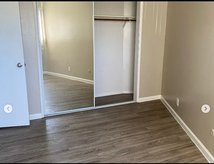 High ceilings and bright natural light throughout every room, paired with sliding mirrored closet doors and extra-long wall-to-wall closets. Finished with two-tone paint for a clean, modern look.