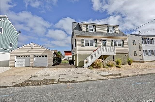 Raised Cape & 2 car Garage