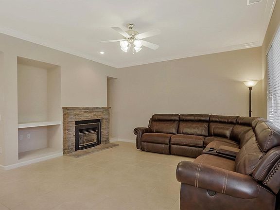 Family room area with fireplace.