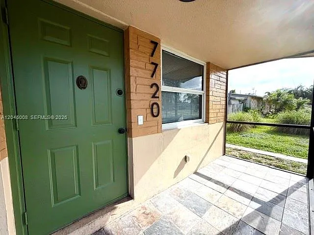 7720 Raleigh St — Photo 3
