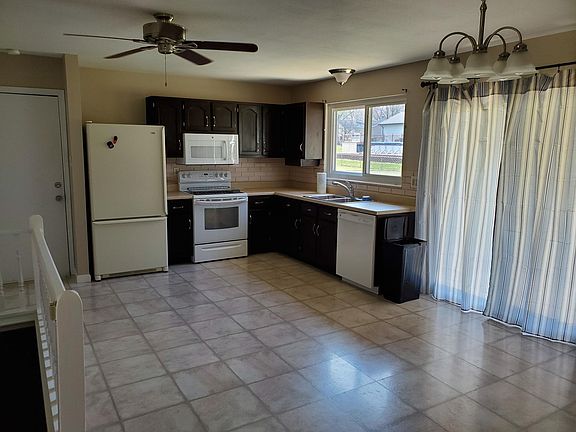 Kitchen with large eating area.