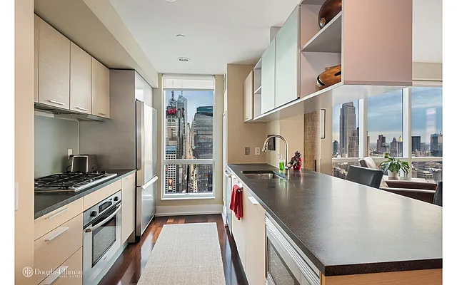 Sold by Douglas Elliman | media 11