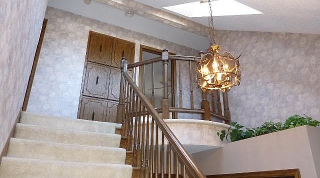 Enter home to an Incredible open stair with princess balcony Note one of two shylights that light the stairs and entry