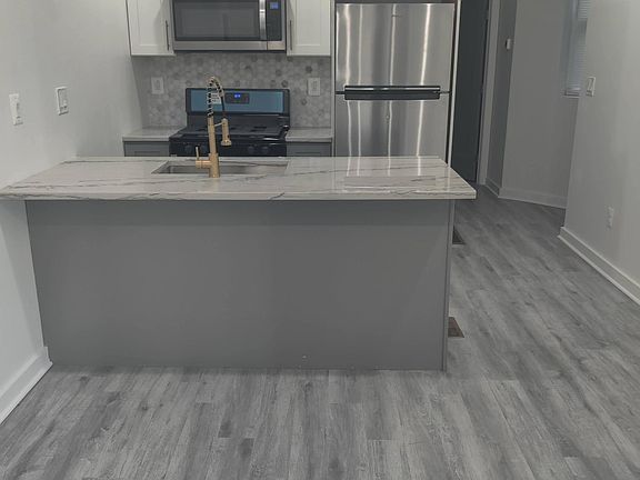 2nd image of 58XX Delancey St Unit 1